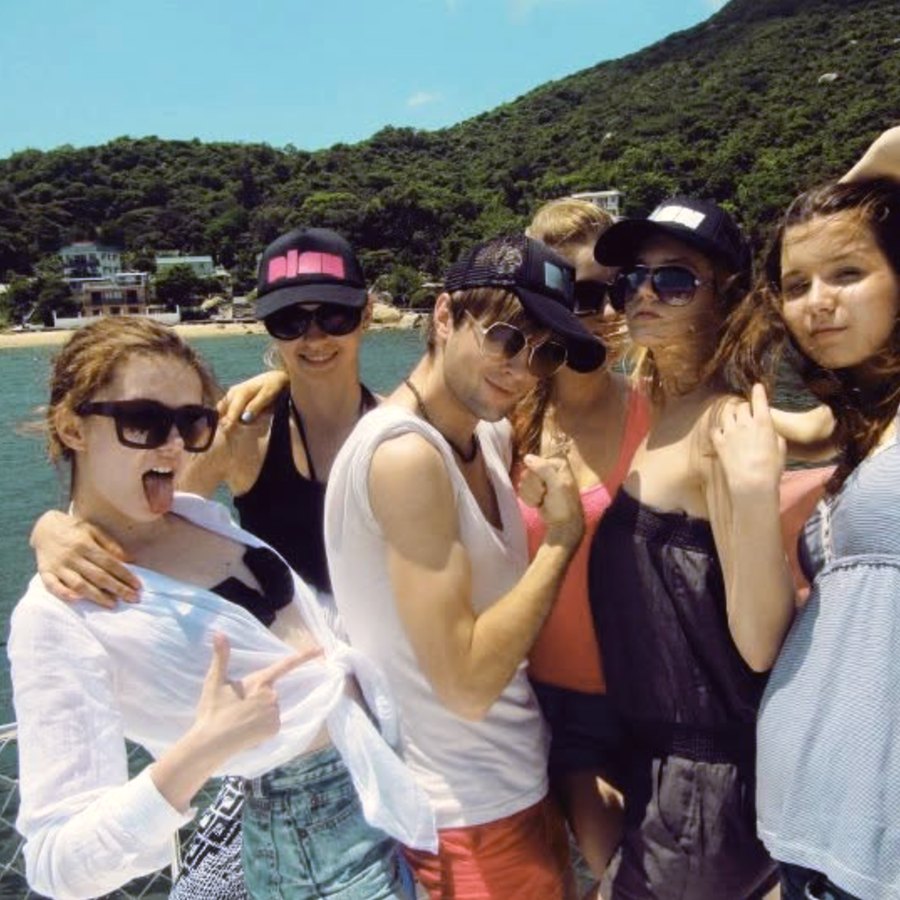 Olivier Passebecq with friends on a boat in Hong Kong