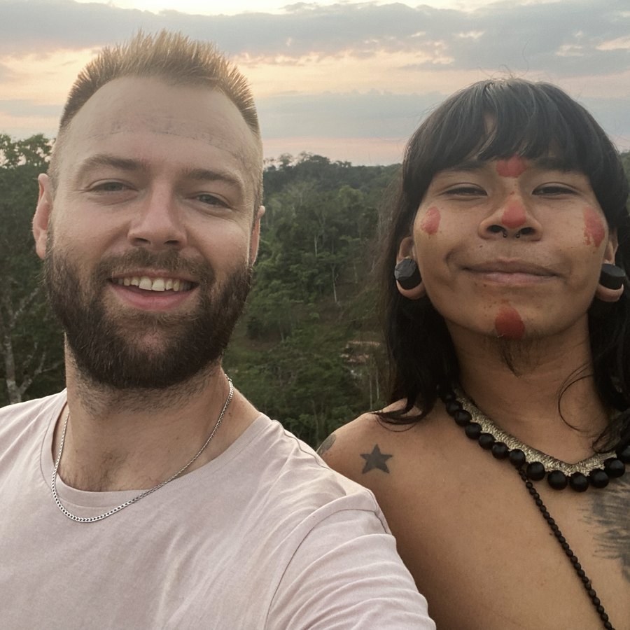 Olivier Passebecq with his friend Minta, from the Waorani, at sunset in the Amazon